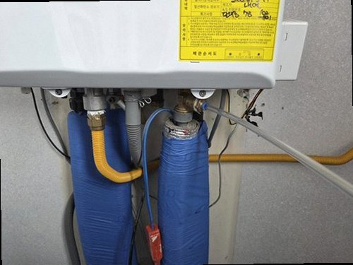 오산 누수탐지 건물 내부 급수관과 난방 배관의 흐름을 설명하는 단면도